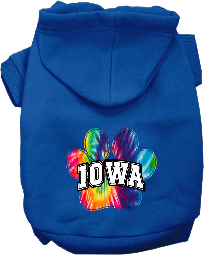 A small to medium pet wearing a colorful Iowa Bright Tie Dye hoodie, showcasing its soft fabric and convenient leash access hole.
