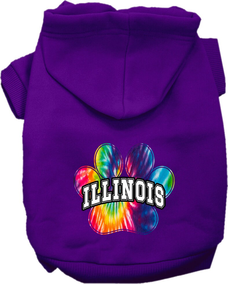 A small to medium pet wearing a colorful Illinois Bright Tie Dye hoodie, showcasing its soft fabric and convenient leash access hole.