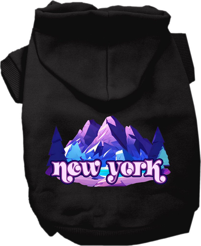 A small to medium pet wearing a stylish screen printed hoodie with a 'New York Alpine Pawscape' design, showcasing comfort and durability.