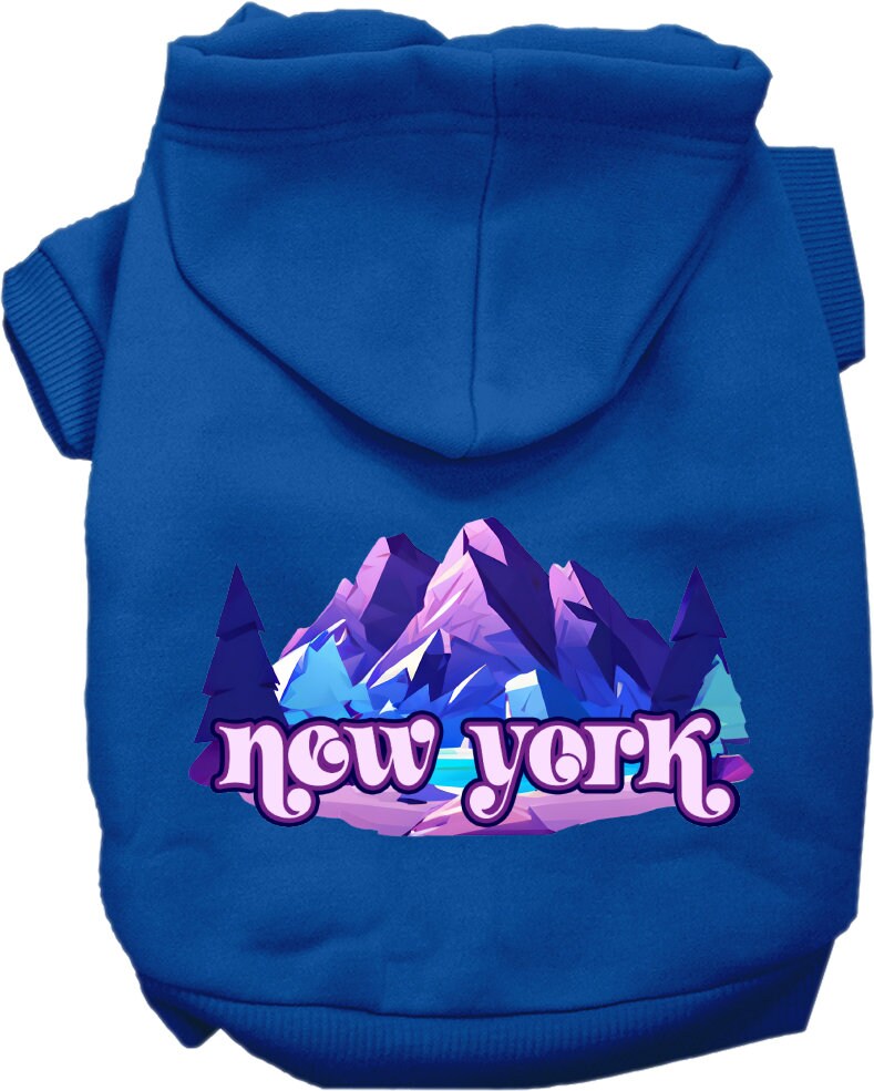 A small to medium pet wearing a stylish screen printed hoodie with a 'New York Alpine Pawscape' design, showcasing comfort and durability.
