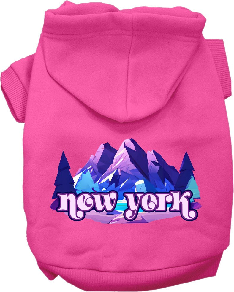A small to medium pet wearing a stylish screen printed hoodie with a 'New York Alpine Pawscape' design, showcasing comfort and durability.