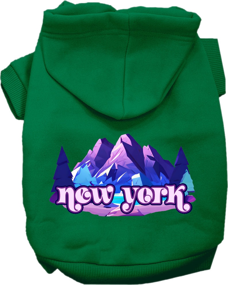 A small to medium pet wearing a stylish screen printed hoodie with a 'New York Alpine Pawscape' design, showcasing comfort and durability.
