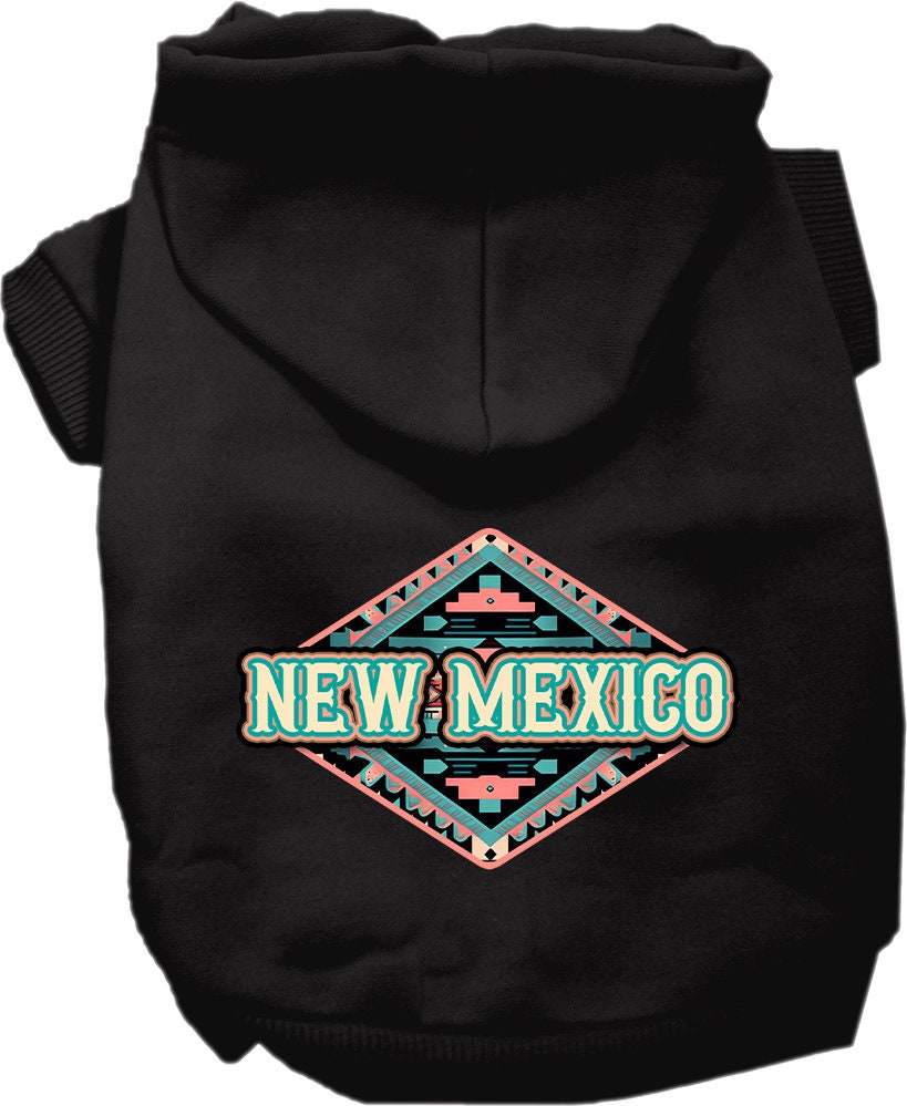 A small to medium pet wearing a soft, warm hoodie with a New Mexico Peach Aztec design, showcasing its stylish and durable features.