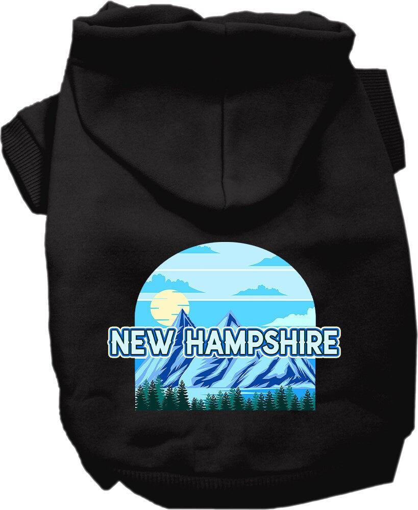 A small to medium pet wearing a stylish screen printed hoodie with a New Hampshire Trailblazer design, showcasing its soft fabric and convenient leash access.