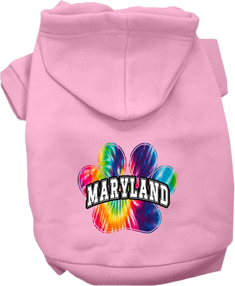 A small to medium pet wearing a colorful Maryland Bright Tie Dye hoodie, showcasing its soft fabric and stylish design.