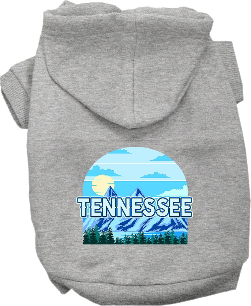 A small to medium pet wearing a soft, warm hoodie with a Tennessee Trailblazer design, showcasing its stylish and comfortable fit.