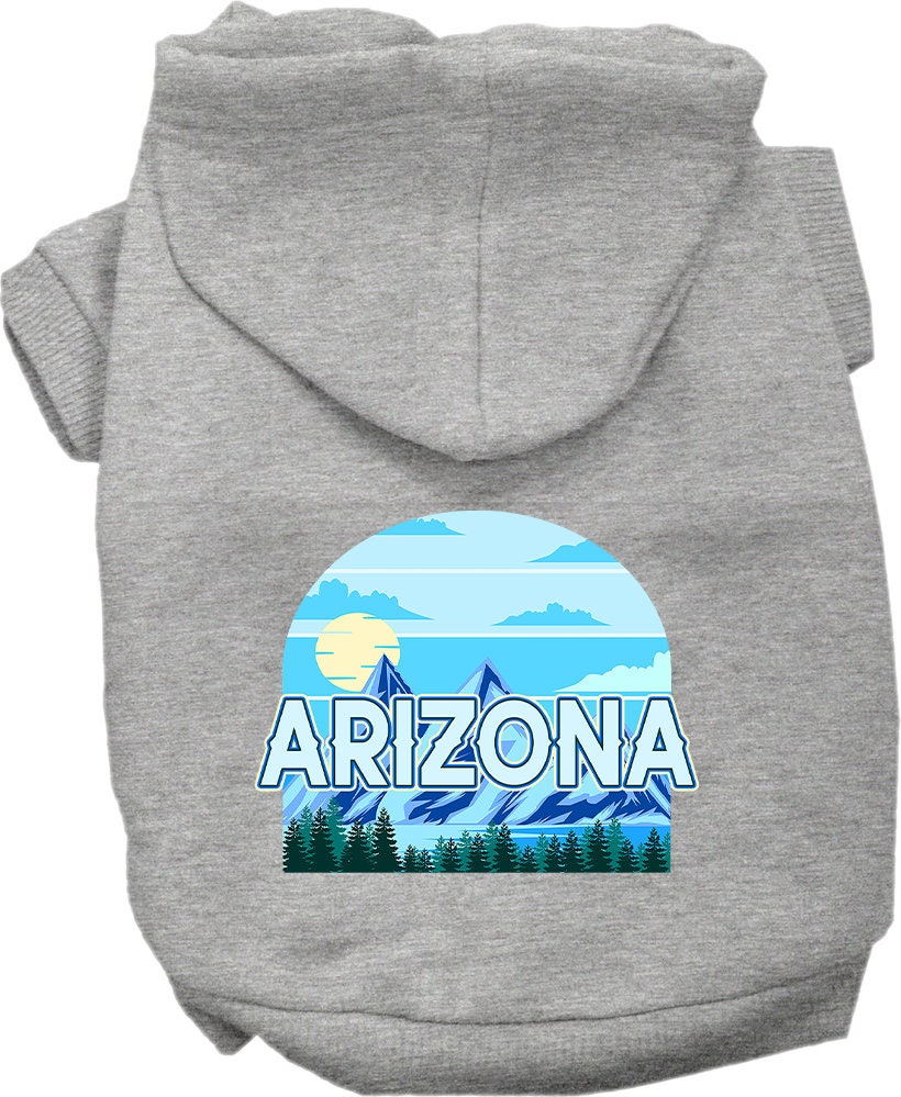 A small to medium pet wearing a soft and warm screen printed hoodie, featuring the 'Arizona Trailblazer' design, perfect for chilly weather.