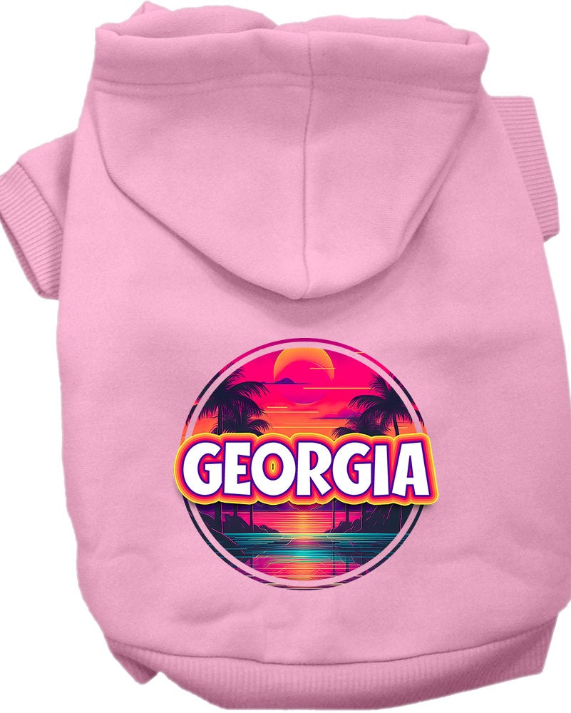 A small to medium pet wearing a vibrant Georgia Neon Beach Sunset hoodie, showcasing its soft fabric and stylish design.