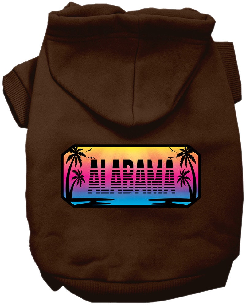 A small to medium pet wearing a cozy screen printed hoodie with Alabama Beach Shades design, showcasing its soft fabric and convenient leash access hole.