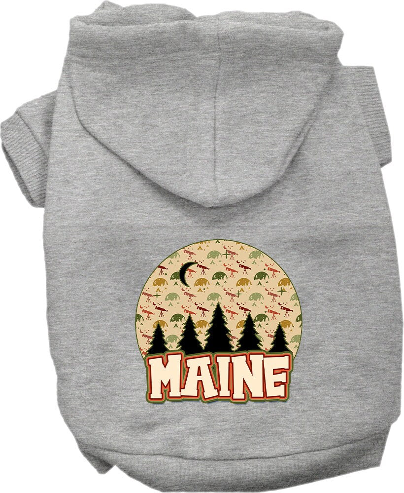 A cozy screen printed hoodie for small to medium pets featuring a 'Maine Under The Stars' design, showcasing its soft fabric and convenient leash access hole.