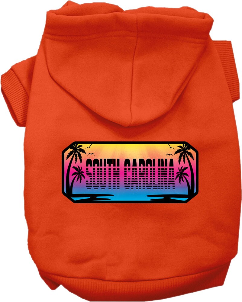 A small to medium pet wearing a stylish screen printed hoodie with a South Carolina Beach Shades design, showcasing vibrant colors and a comfortable fit.