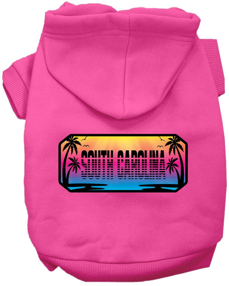 A small to medium pet wearing a stylish screen printed hoodie with a South Carolina Beach Shades design, showcasing vibrant colors and a comfortable fit.