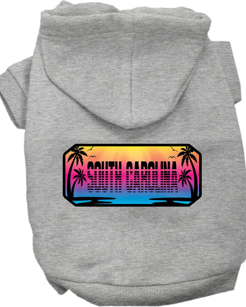 A small to medium pet wearing a stylish screen printed hoodie with a South Carolina Beach Shades design, showcasing vibrant colors and a comfortable fit.
