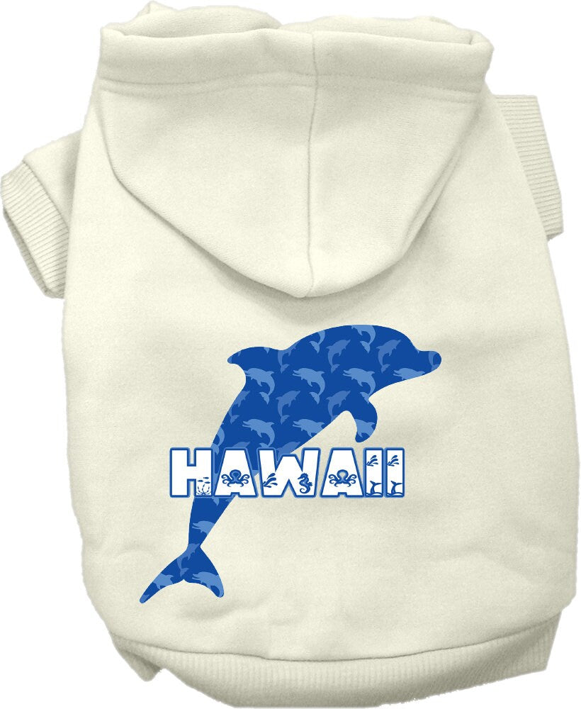 A small to medium pet wearing a Hawaii Blue Dolphins screen printed hoodie, showcasing its vibrant design and comfortable fit.