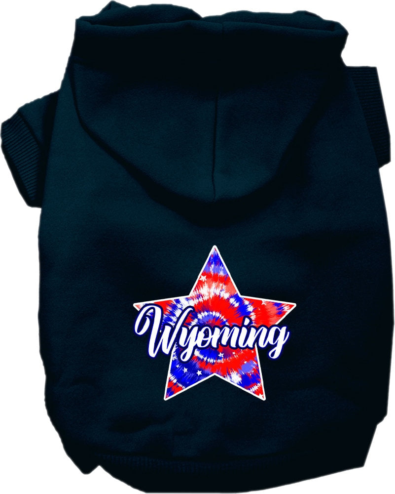 A small to medium pet wearing a Wyoming Patriotic Tie Dye hoodie, showcasing its vibrant colors and comfortable fit.