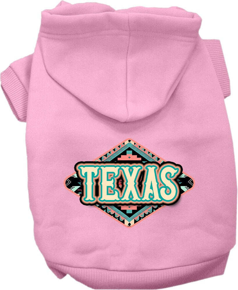 A small to medium pet wearing a stylish Texas Peach Aztec screen printed hoodie, showcasing its soft fabric and convenient leash access hole.