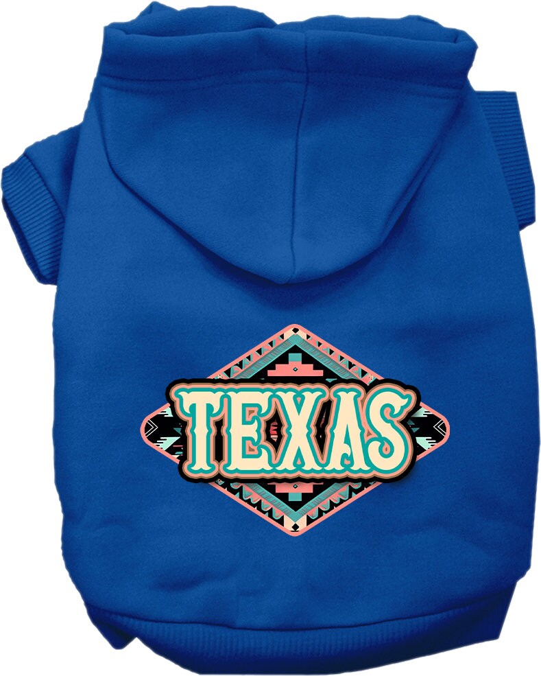 A small to medium pet wearing a stylish Texas Peach Aztec screen printed hoodie, showcasing its soft fabric and convenient leash access hole.