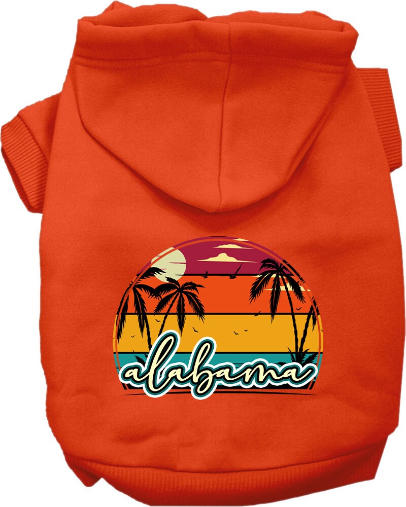 A small to medium pet wearing a stylish screen printed hoodie featuring the Alabama Retro Beach Sunset design, showcasing comfort and durability.