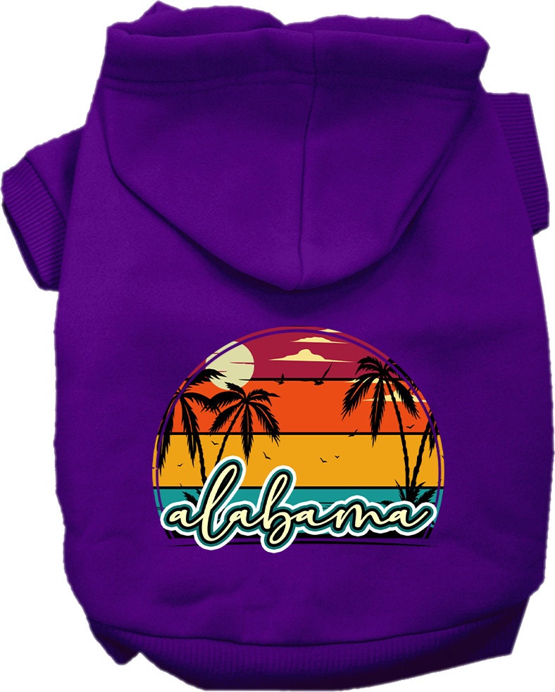 A small to medium pet wearing a stylish screen printed hoodie featuring the Alabama Retro Beach Sunset design, showcasing comfort and durability.