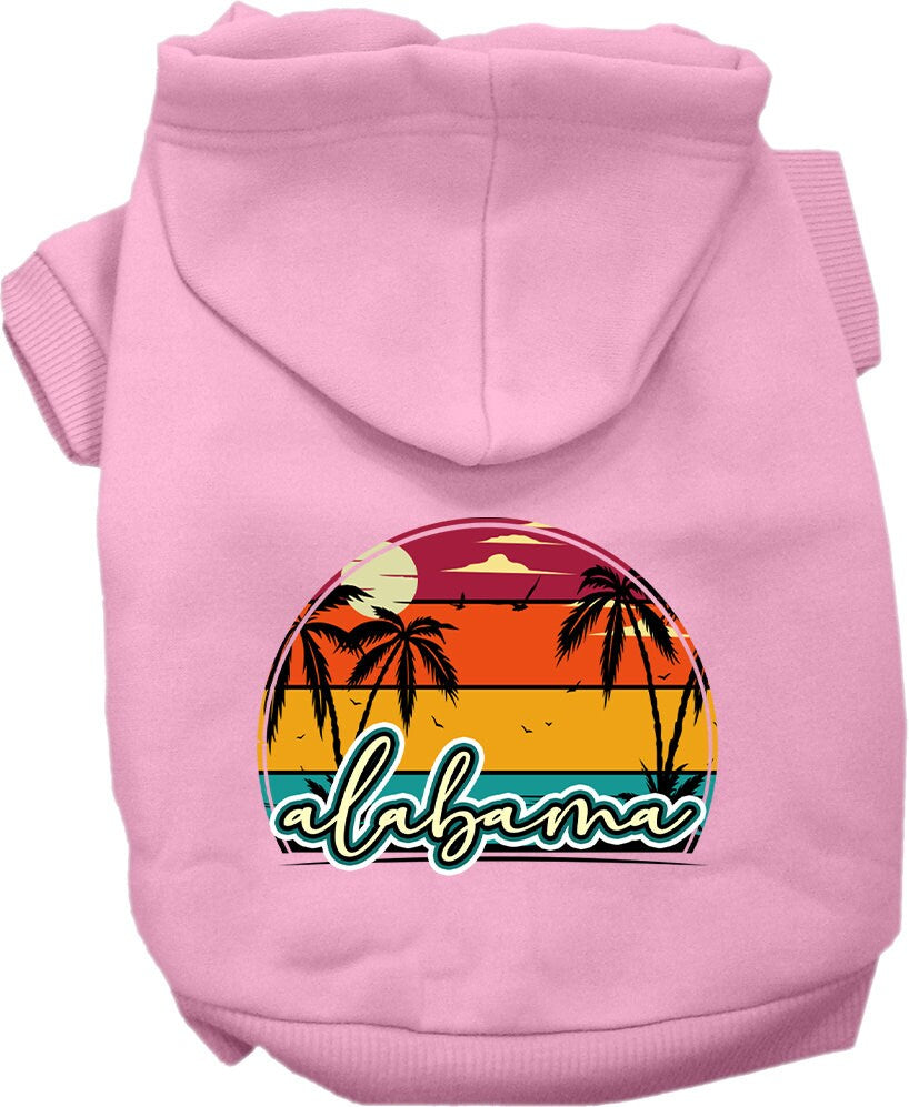 A small to medium pet wearing a stylish screen printed hoodie featuring the Alabama Retro Beach Sunset design, showcasing comfort and durability.