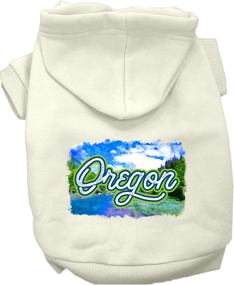 A small to medium pet wearing a cozy Oregon Summer screen printed hoodie, showcasing its vibrant design and comfortable fit.