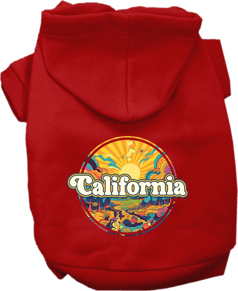 A small to medium pet wearing a California Trippy Peaks screen printed hoodie, showcasing its vibrant design and cozy fit.