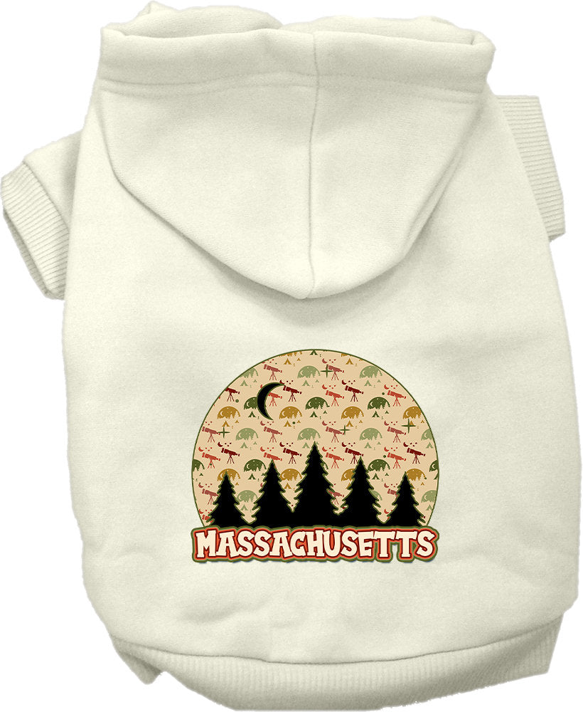 A small to medium pet wearing a cozy screen printed hoodie with 'Massachusetts Under The Stars' design, showcasing its soft fabric and convenient leash access.