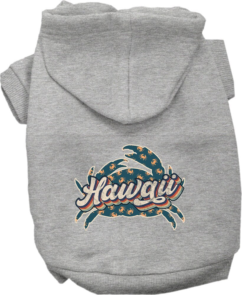 A small to medium pet wearing a cozy hoodie with a Hawaii Retro Crabs design, showcasing its soft fabric and stylish look.