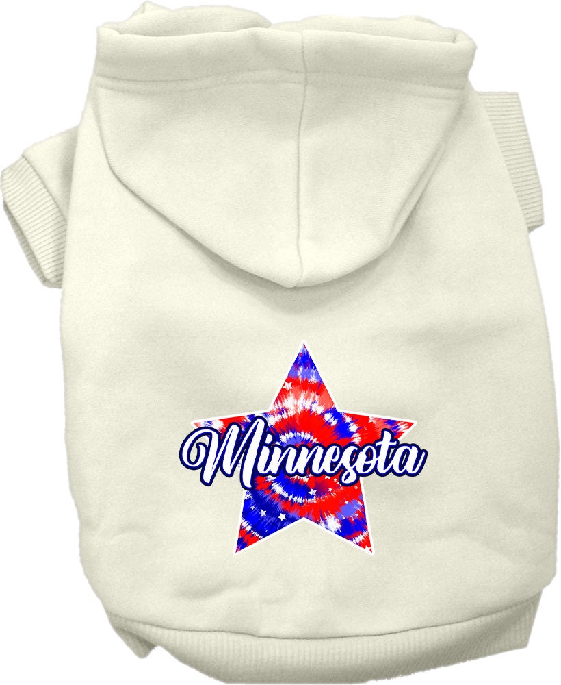 A small to medium pet wearing a Minnesota Patriotic Tie Dye hoodie, showcasing its vibrant colors and comfortable fit.
