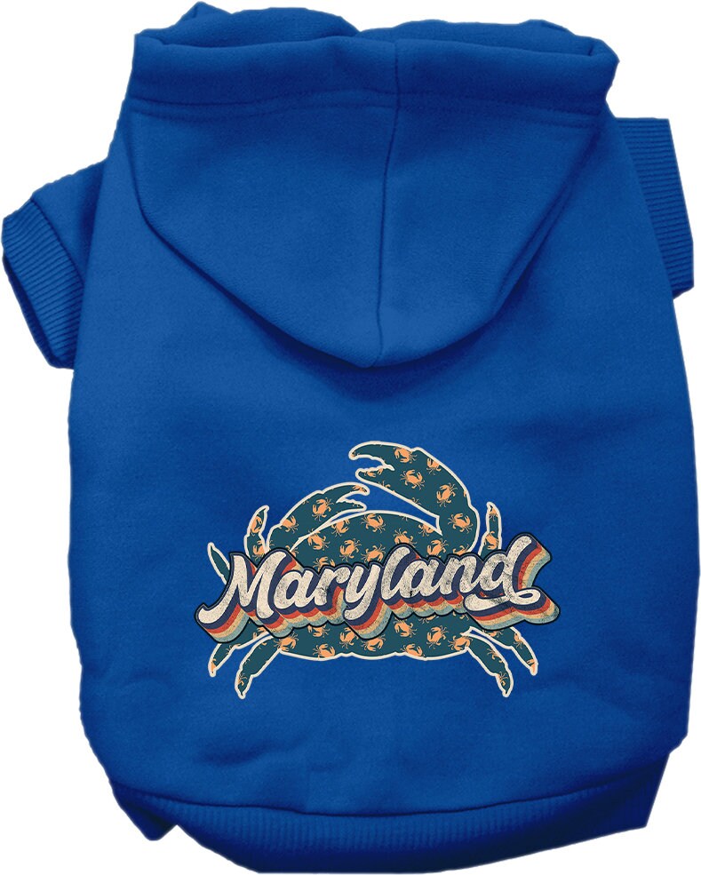 A small to medium pet wearing a Maryland Retro Crabs screen printed hoodie, showcasing its soft fabric and stylish design.