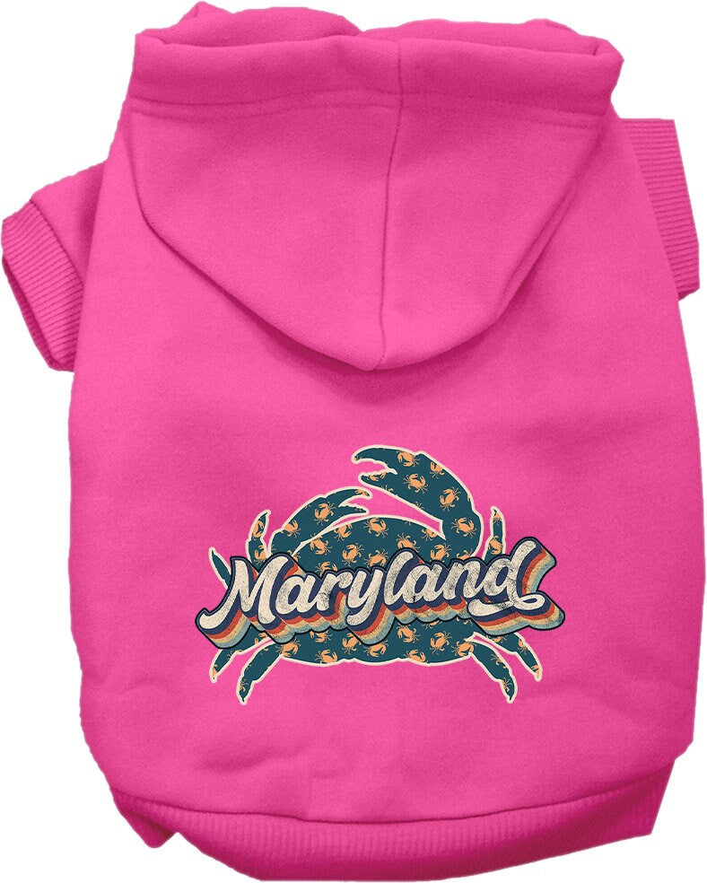 A small to medium pet wearing a Maryland Retro Crabs screen printed hoodie, showcasing its soft fabric and stylish design.