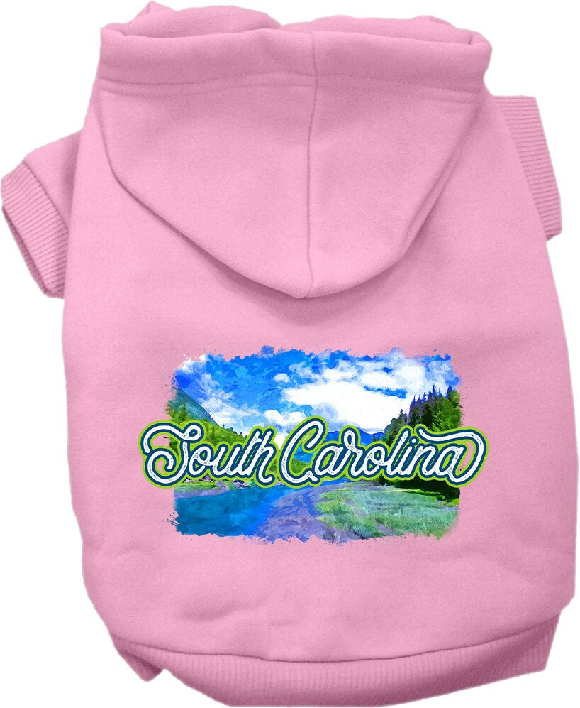 A small to medium pet wearing a soft, warm screen printed hoodie with a South Carolina Summer design, showcasing its stylish and comfortable fit.