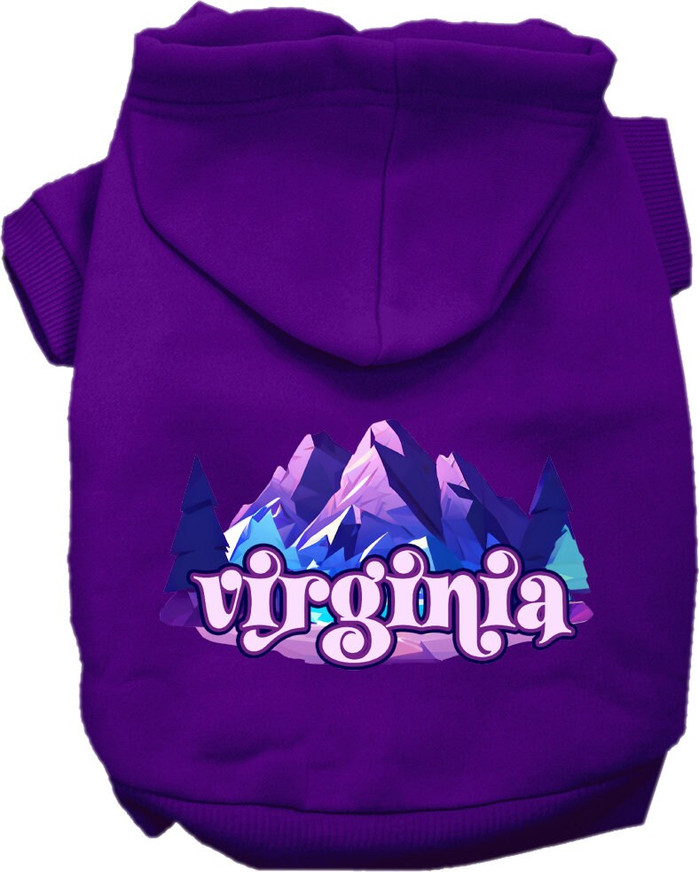 A small to medium pet wearing a cozy screen printed hoodie with a Virginia Alpine Pawscape design, showcasing its soft fabric and convenient leash access.