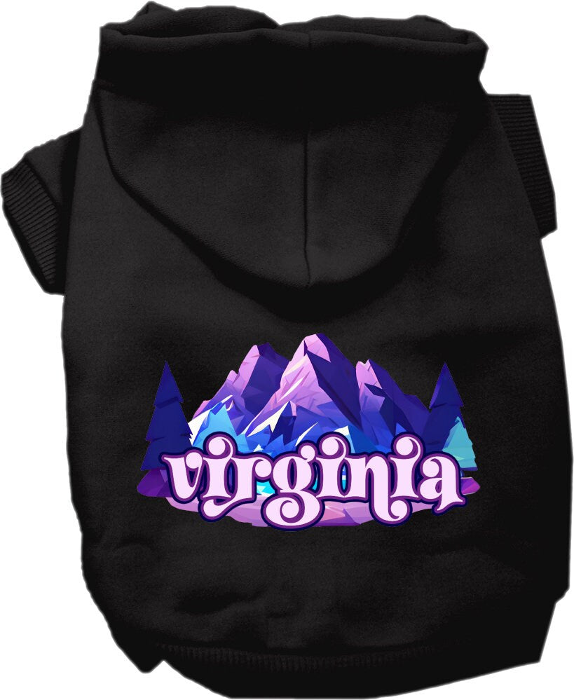 A small to medium pet wearing a cozy screen printed hoodie with a Virginia Alpine Pawscape design, showcasing its soft fabric and convenient leash access.