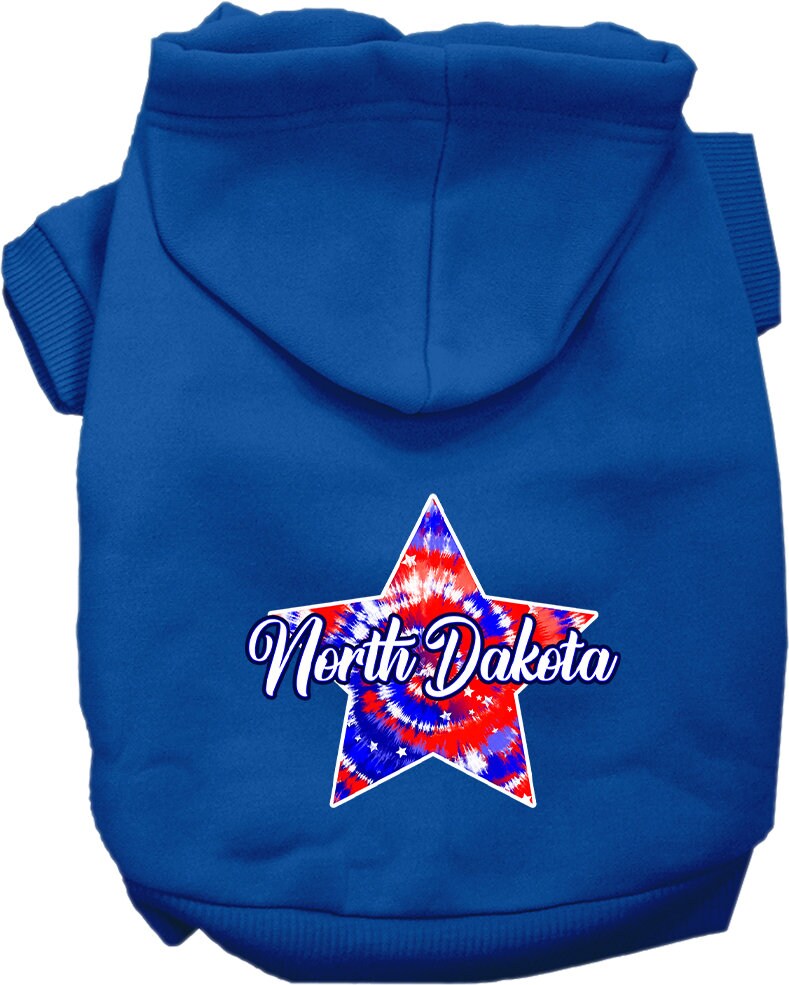 A small to medium pet wearing a North Dakota Patriotic Tie Dye hoodie, showcasing vibrant colors and a cozy fit.
