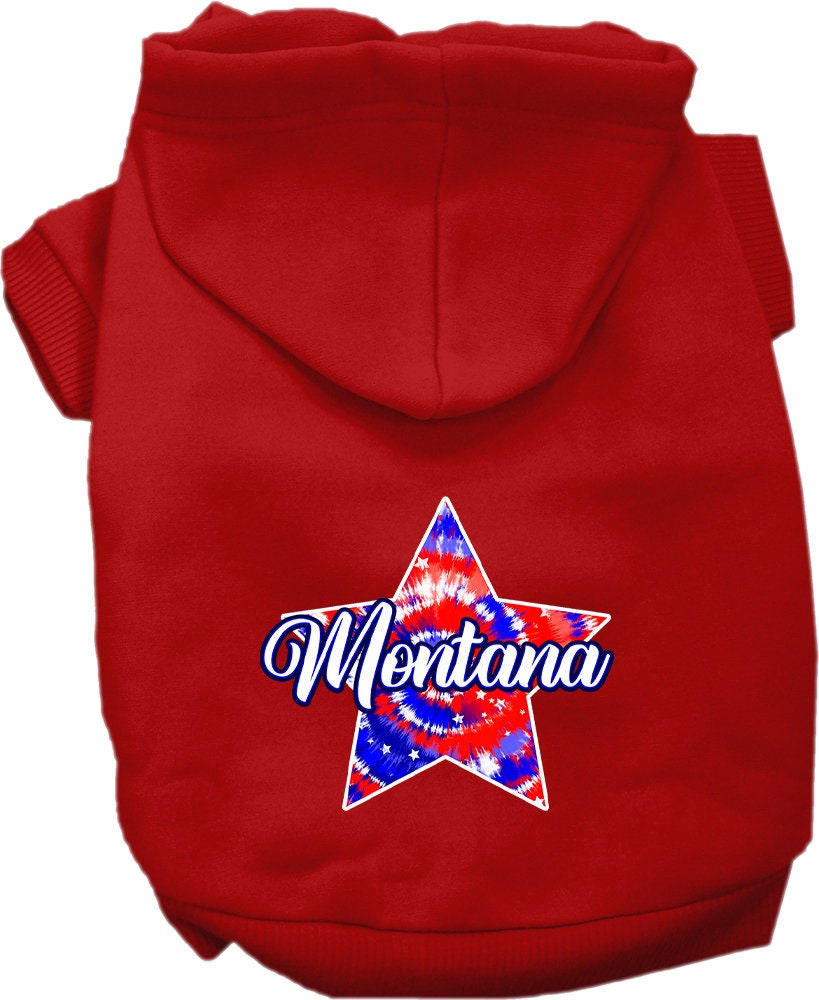 A small to medium pet wearing a Montana Patriotic Tie Dye hoodie, showcasing vibrant colors and a comfortable fit.