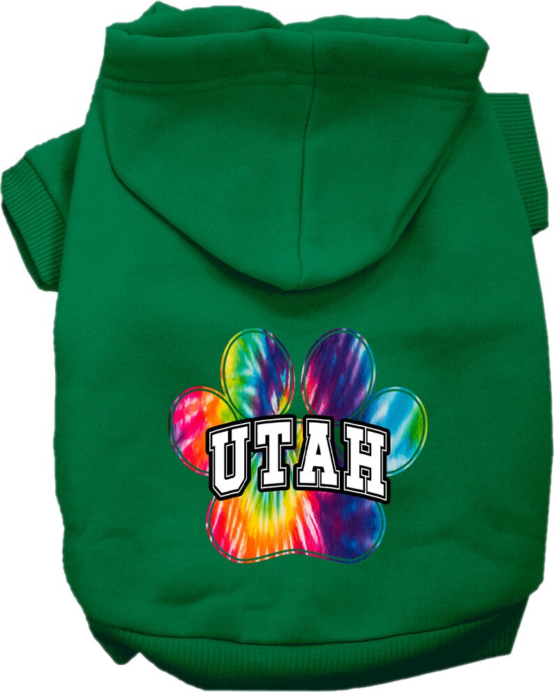 A small to medium pet wearing a colorful 'Utah Bright Tie Dye' hoodie, showcasing its soft fabric and convenient leash access hole.