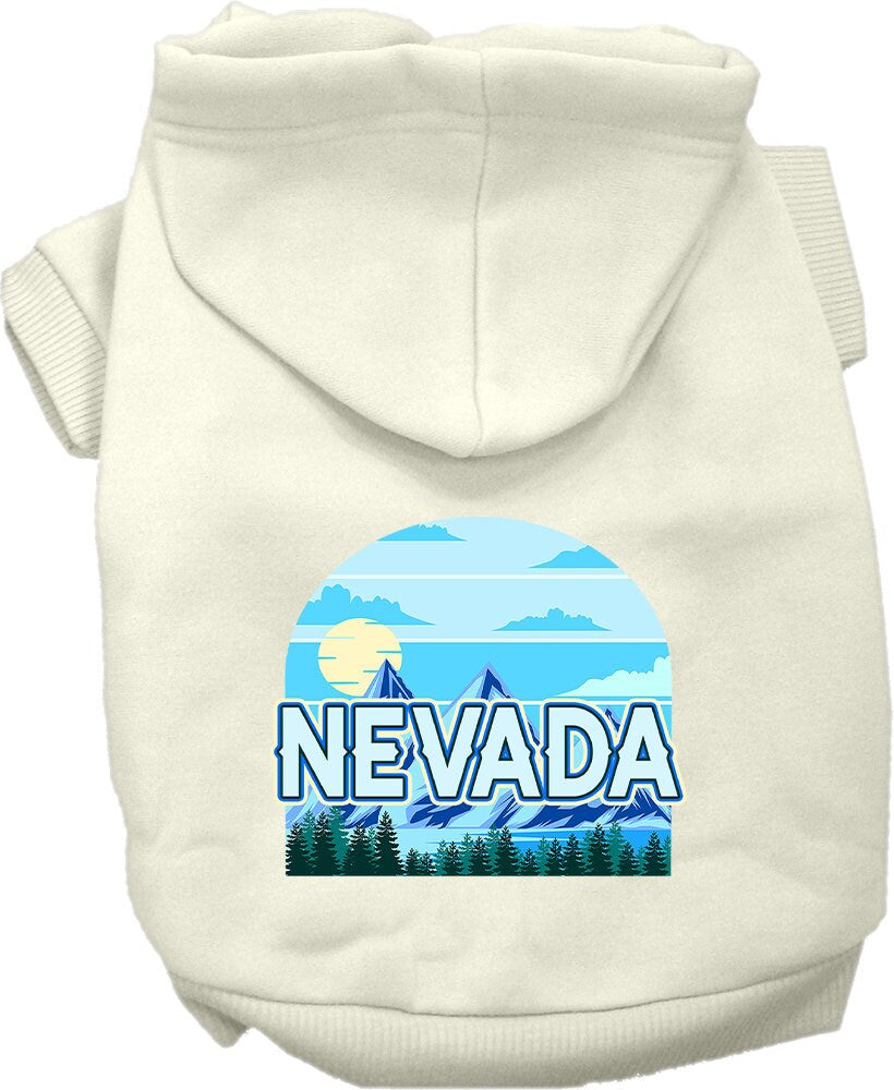 A small to medium pet wearing a stylish 'Nevada Trailblazer' hoodie, showcasing its soft fabric and convenient leash access hole.