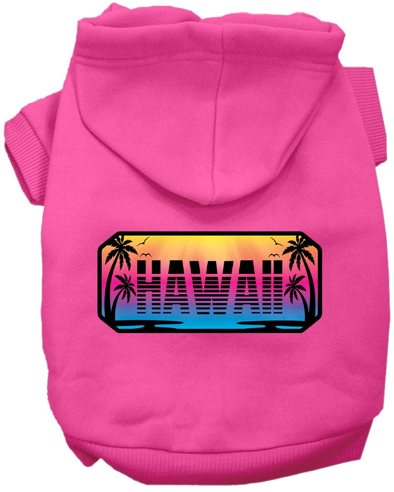 A small to medium pet wearing a soft, warm hoodie with a Hawaii Beach Shades design, showcasing vibrant colors and a comfortable fit.