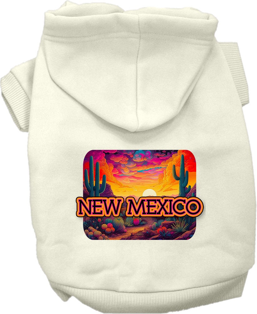 A small to medium pet wearing a vibrant New Mexico Neon Desert printed hoodie, showcasing its soft fabric and convenient leash access hole.