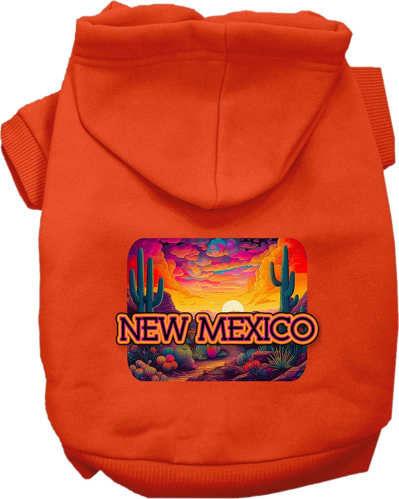 A small to medium pet wearing a vibrant New Mexico Neon Desert printed hoodie, showcasing its soft fabric and convenient leash access hole.