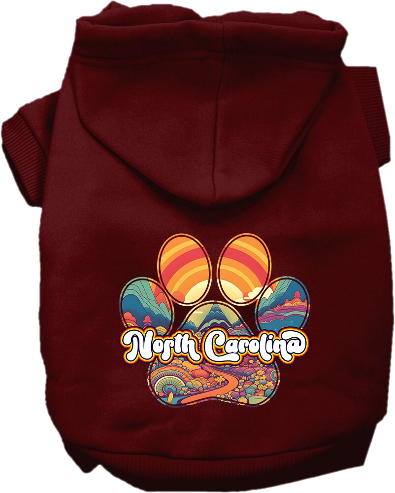 A cozy pet hoodie for small to medium dogs and cats, featuring a vibrant 'North Carolina Groovy Summit' print, designed for comfort and durability.