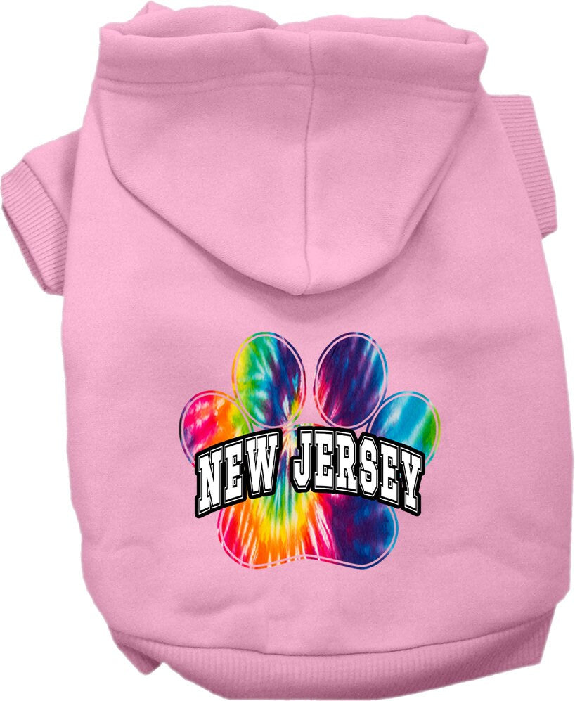 A small to medium pet wearing a colorful New Jersey Bright Tie Dye hoodie, showcasing its soft fabric and stylish design.