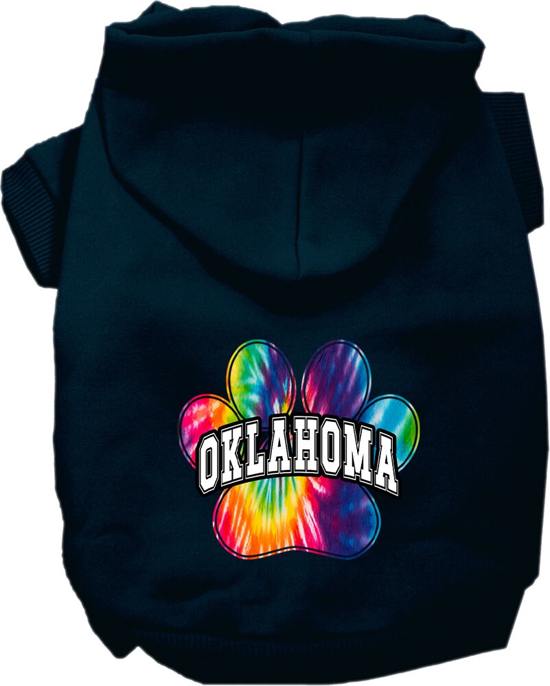 A small to medium pet wearing a vibrant Oklahoma Bright Tie Dye hoodie, showcasing its soft fabric and convenient leash access hole.