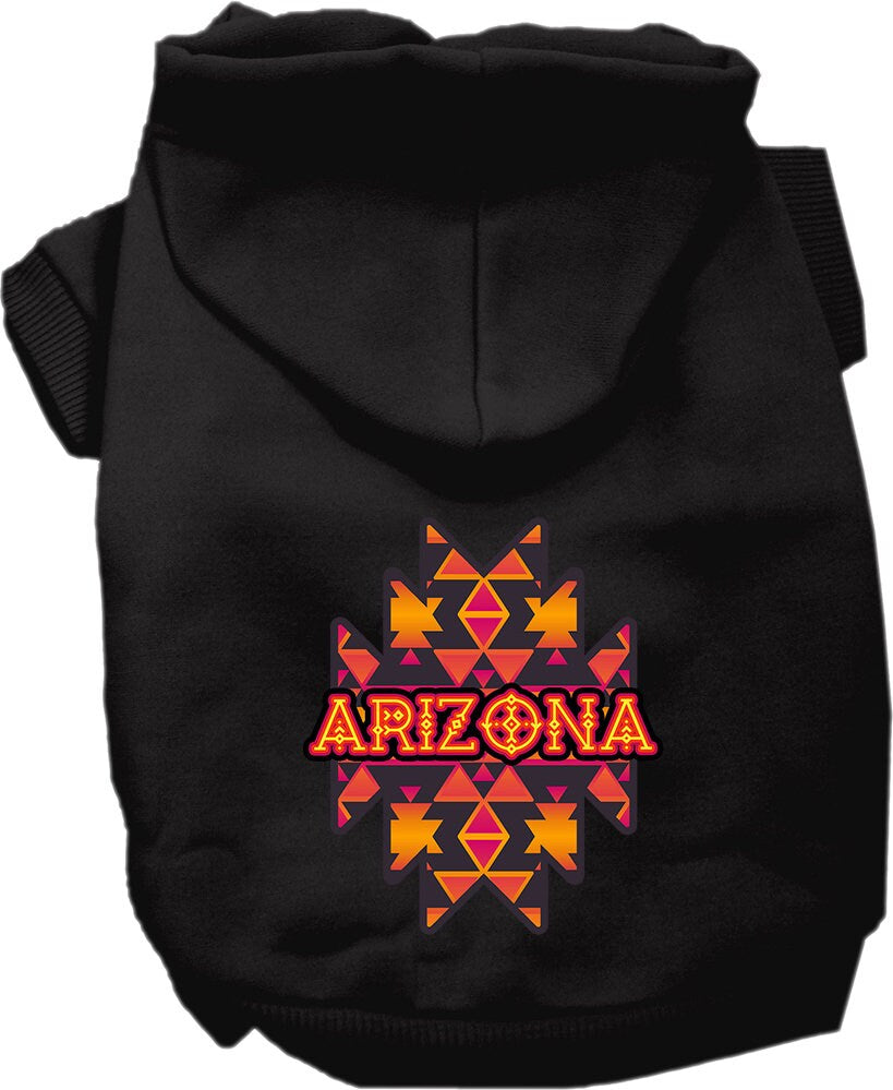 A small to medium pet wearing a cozy Arizona Navajo Tribal screen printed hoodie, showcasing its unique design and comfortable fit.