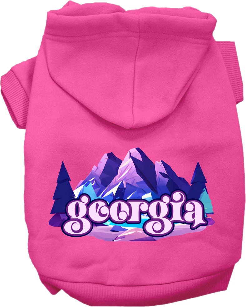 A cozy screen printed hoodie for small to medium pets, featuring a unique 'Georgia Alpine Pawscape' design, perfect for walks and outdoor activities.
