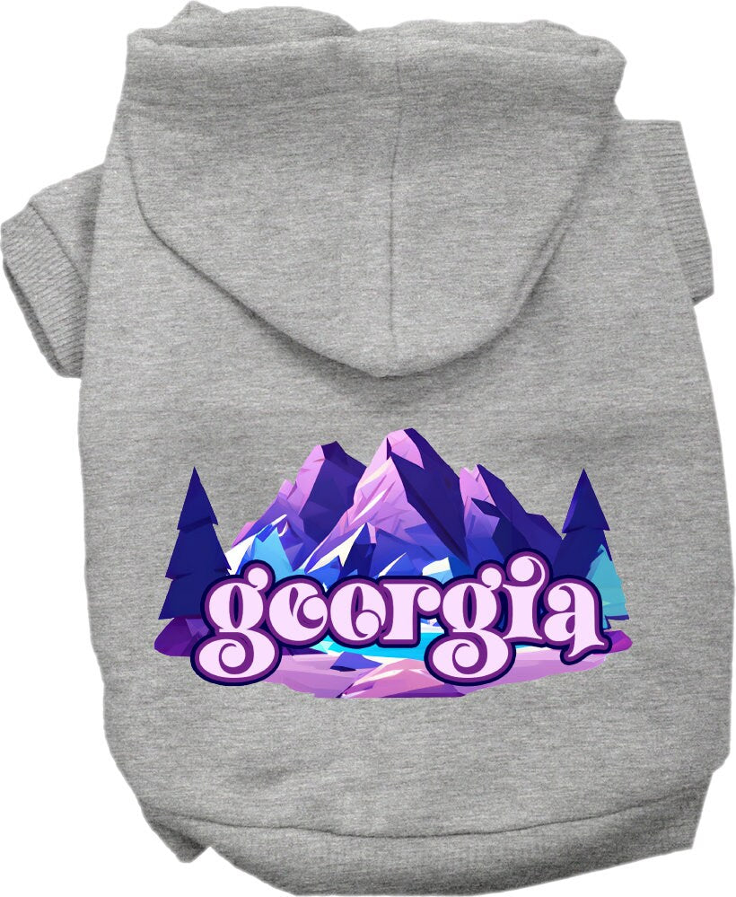 A cozy screen printed hoodie for small to medium pets, featuring a unique 'Georgia Alpine Pawscape' design, perfect for walks and outdoor activities.