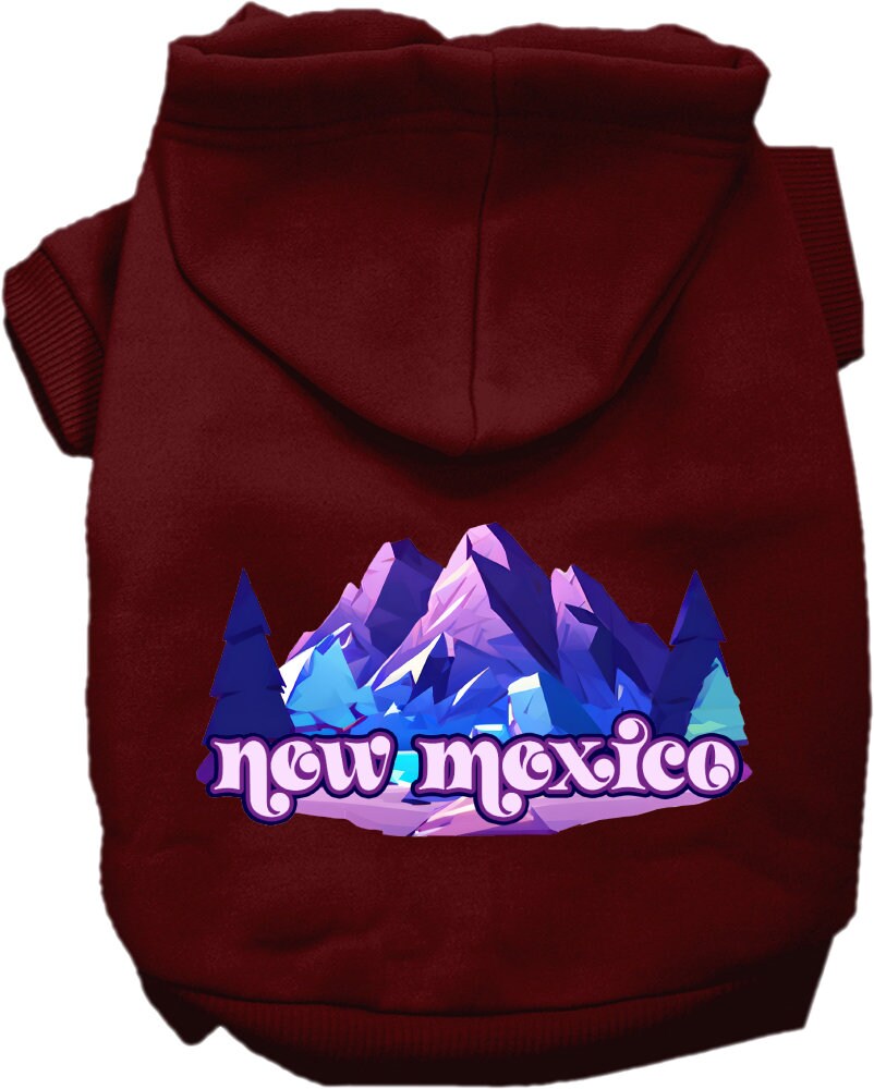 A cozy screen printed hoodie for small to medium pets featuring a New Mexico Alpine Pawscape design, perfect for chilly weather.
