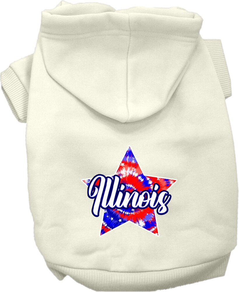 A small to medium pet wearing a colorful Illinois Patriotic Tie Dye hoodie, showcasing its soft fabric and convenient leash access hole.