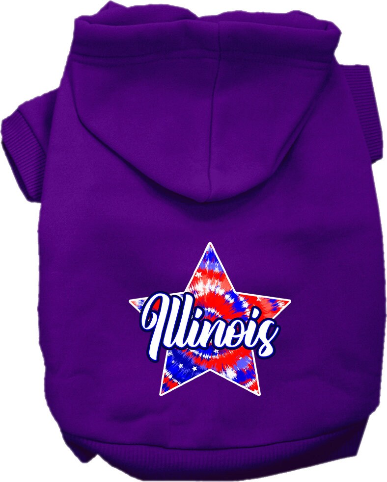 A small to medium pet wearing a colorful Illinois Patriotic Tie Dye hoodie, showcasing its soft fabric and convenient leash access hole.